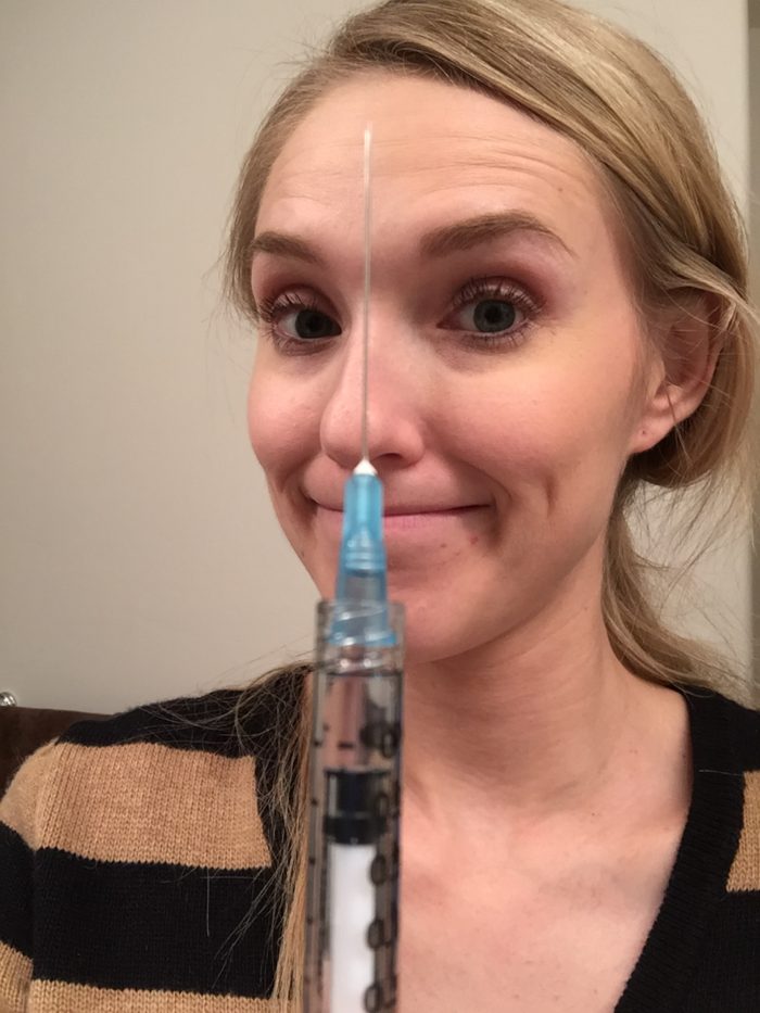 Infertility and IVF Q&A Part 1 featured by top infertility blog, A Slice of Style: image of a patient and her injections