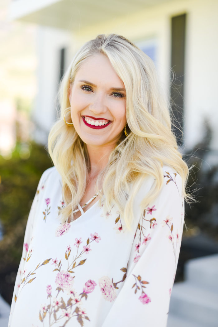 floral top and white jeans