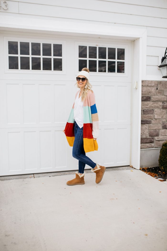 J Crew Factory Sale featured by top US fashion blog A Slice of Style; Image of woman wearing striped cardigan and beanie from J Crew Factory