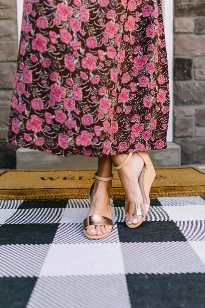 Affordable Women's Fashion featured by top US life and style blog A Slice of Style; Image of a woman wearing a floral dress and wedges from Walmart.