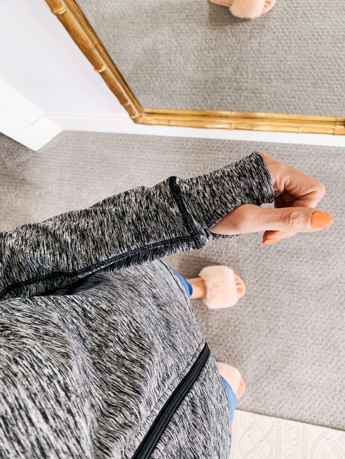 Lululemon dupes found on Amazon featured by top US life and style blog, A Slice of Style: image of a woman wearing CRZ YOGA leggings, CRZ YOGA bra, and Amazon Essentials full zip jacket.