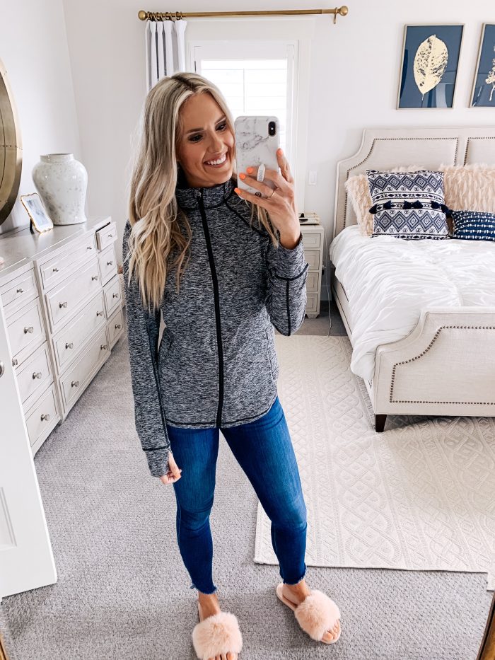 Lululemon dupes found on Amazon featured by top US life and style blog, A Slice of Style: image of a woman wearing CRZ YOGA leggings, CRZ YOGA bra, and Amazon Essentials full zip jacket.