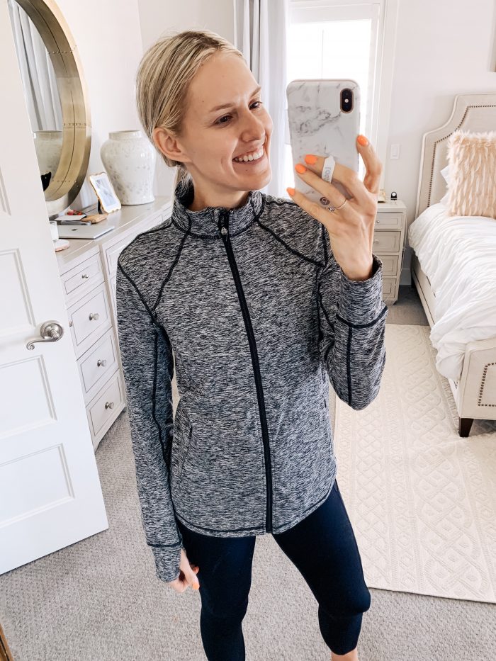 Lululemon dupes found on Amazon featured by top US life and style blog, A Slice of Style: image of a woman wearing CRZ YOGA leggings, CRZ YOGA bra, and Amazon Essentials full zip jacket.