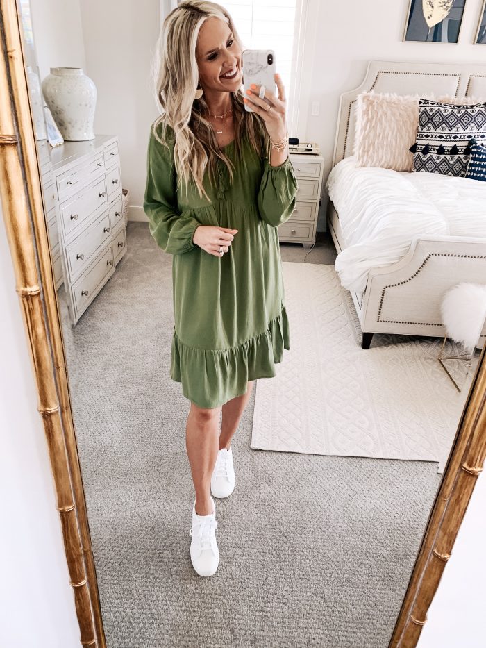 Affordable Walmart fashion favorites featured by top US fashion blog, A Slice of Style: image of a woman wearing a Time and Tru olive midi dress and white sneakers available at Walmart