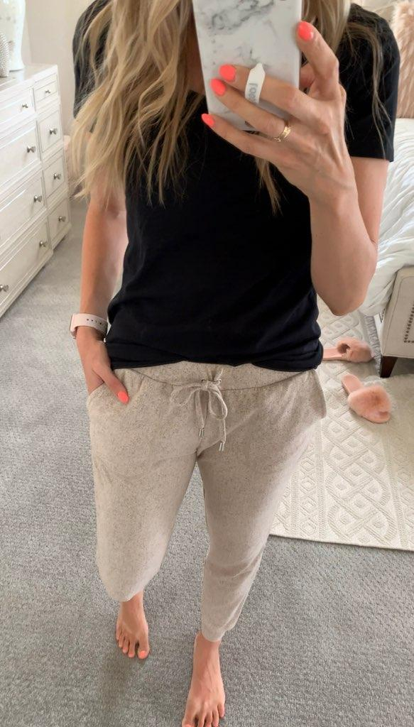 Best of Amazon Prime Day: $7.50 Earrings You Need! by popular Utah fashion blog, A Slice of Style: image of a woman taking a selfie in front of full body mirror and wearing a black v-neck tee and find. Women's Tracksuit Bottoms in Super Soft for Jogging.