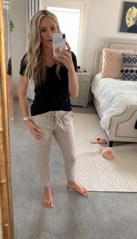 Best of Amazon Prime Day: $7.50 Earrings You Need! by popular Utah fashion blog, A Slice of Style: image of a woman taking a selfie in front of full body mirror and wearing a black v-neck tee and find. Women's Tracksuit Bottoms in Super Soft for Jogging.