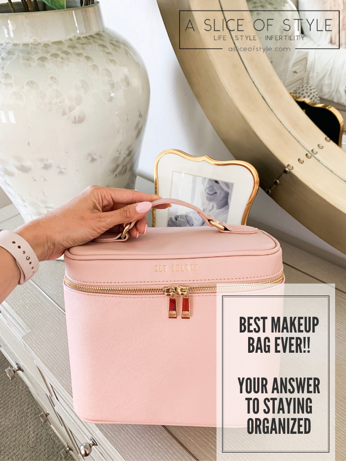 The Only Makeup Bag I'll Ever Need Again!! Sly Beauty Discount Code by popular Utah beauty blog, A Slice of Style: image of a woman's hand holding a pink Sly Beauty Bag.