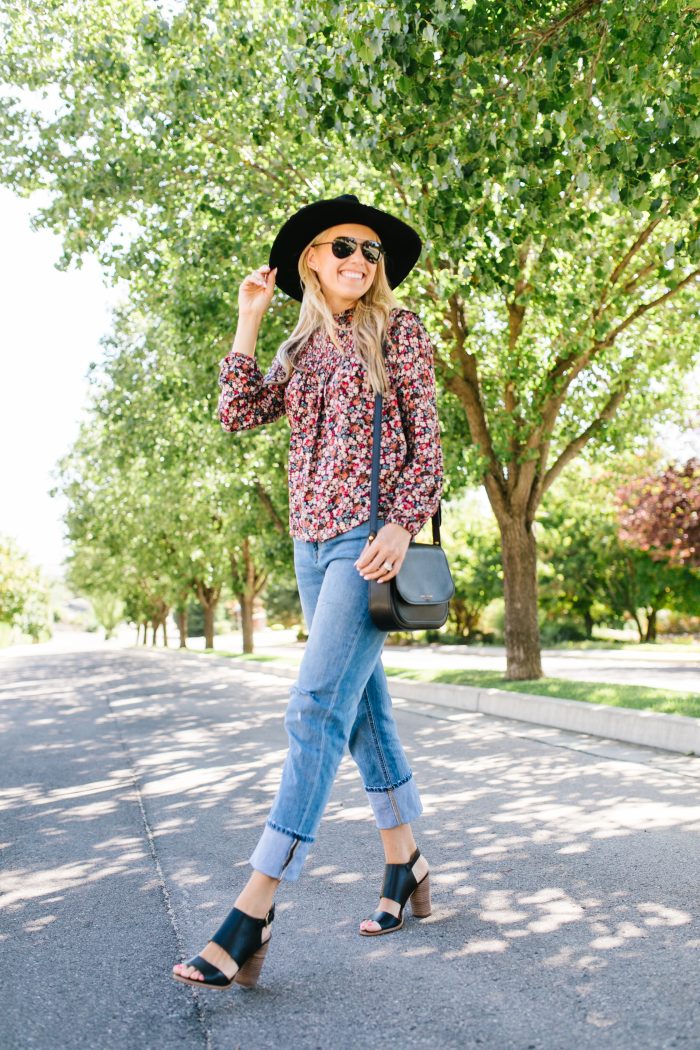 Summer to Fall Transition Pieces from Nordstrom featured by top US life and style blog, A Slice of Style: image of a woman wearing a Rebecca Minkoff crossbody bag, One Print floral blouse, Rachel Parcell girlfriend jeans, Caslon sandals, Polaroid Eyewear aviator sunglasses, and a Brixton felt hat.