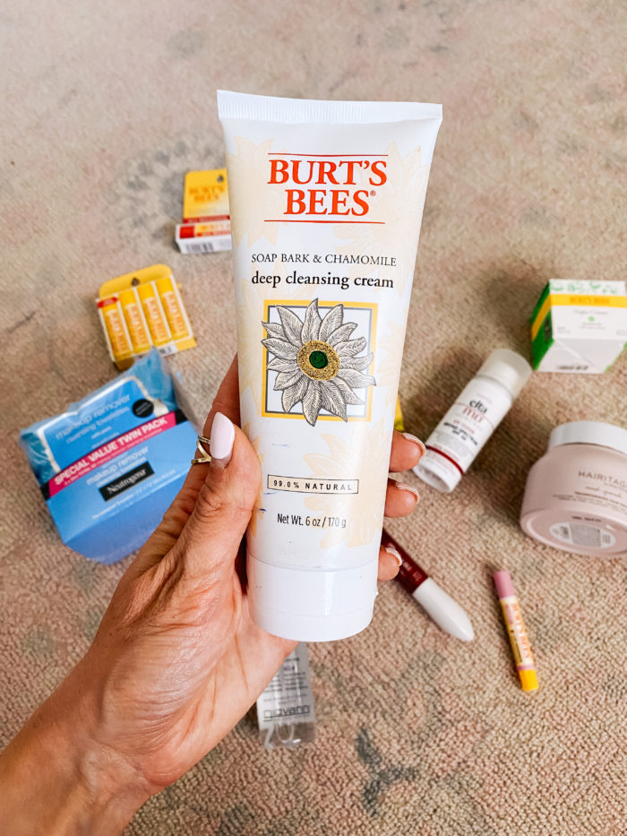 Walmart Beauty Products by popular Utah beauty blog, A Slice of Style: image of a woman holding a tube of Walmart Burt's Bees deep cleansing cream.