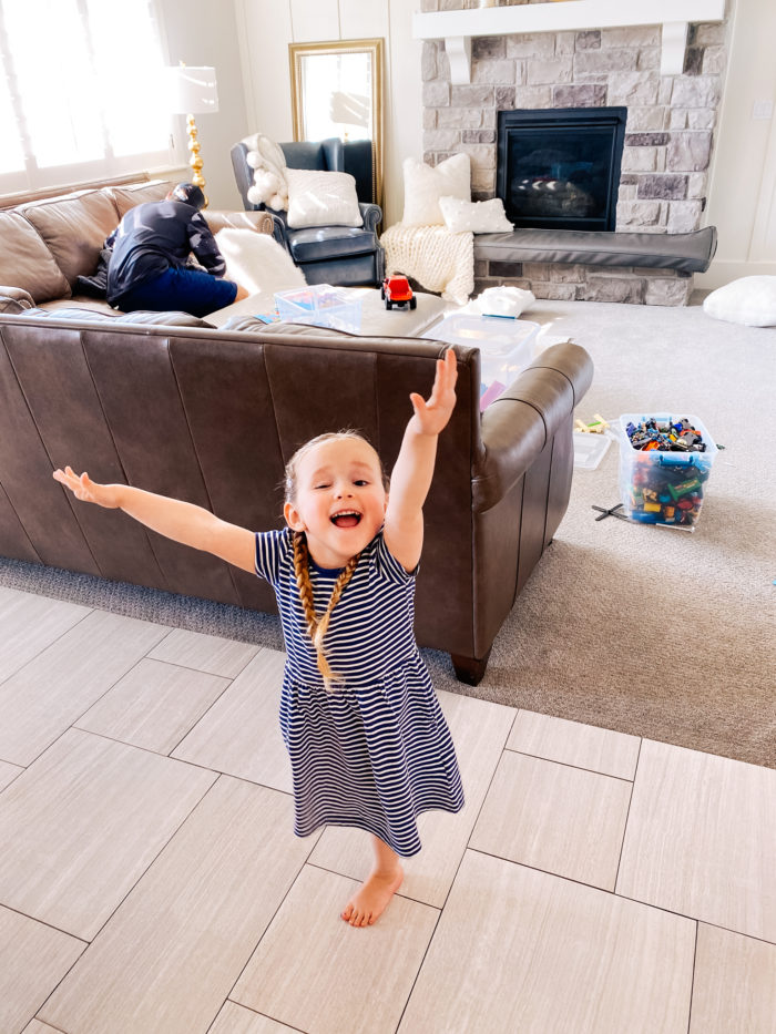 Amazon haul by popular Utah fashion blog, A Slice of Style: image of a little girl wearing a Amazon Simple Joys by Carter's blue and white stripe dress. 