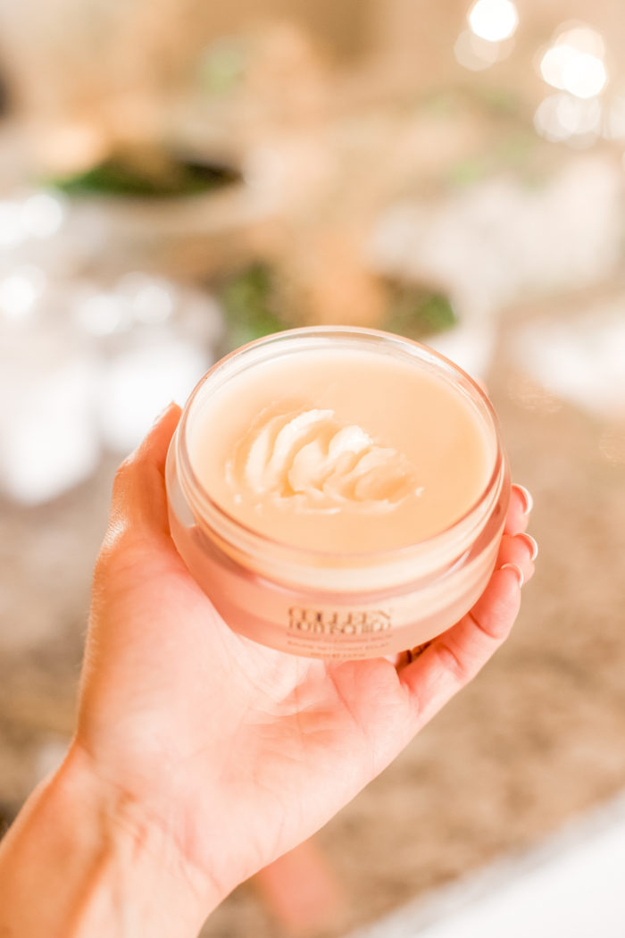 Colleen Rothschild by popular Utah beauty blog, A Slice of Style: image of a woman holding Colleen Rothschild radiant cleansing balm.