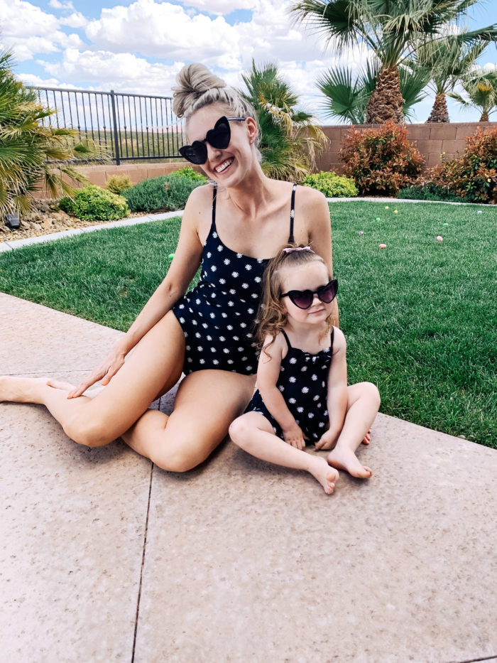 Easter Essentials by popular Utah lifestyle blog, A Slice of Style: image of a mom and daughter wearing matching swimsuits and heart shaped sunglasses. 