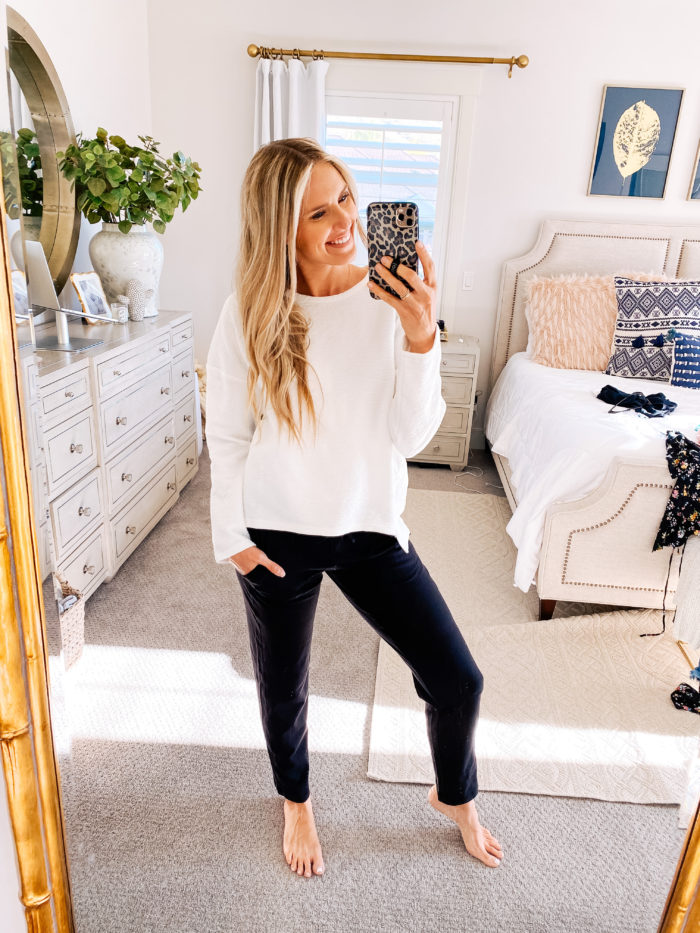 affordable clothes | Walmart fashion by popular Utah fashion blog, A Slice of Style: image of a woman wearing a Walmart Athletic Works Women's Athleisure Core Knit Pant with a white sweater. 