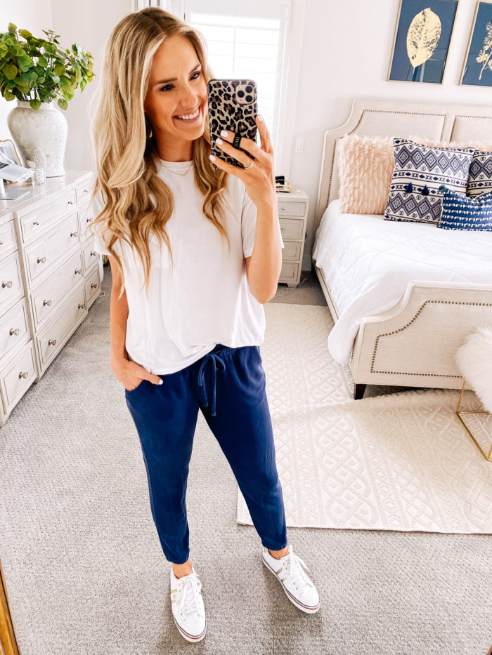 Amazon fashion haul for women | Amazon Fashion Haul by popular Utah fashion blog, A Slice of Style: image of a woman wearing a Amazon Daily Ritual Women's Jersey Short-Sleeve Crewneck Boxy Pocket T-Shirt, blue joggers, and Amazon Tommy Hilfiger Women's Fentii Sneaker. 