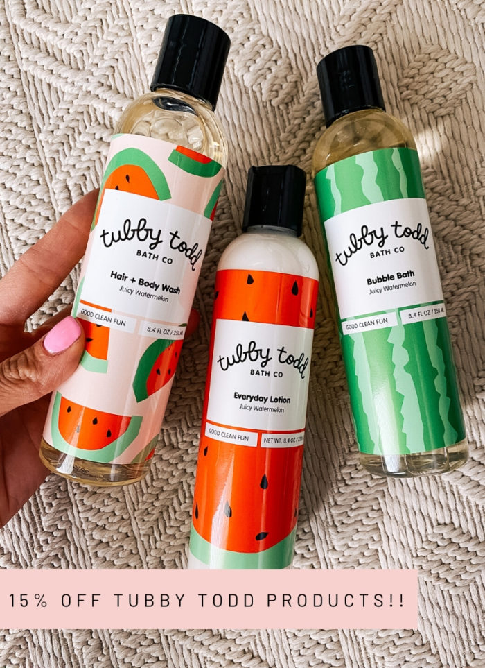 Tubby Todd Discount Code by popular Utah motherhood blog, A Slice of Style: image of a woman holding a bottle of Tubby Todd Hair and body wash, Everyday lotion, and Bubble Bath. 