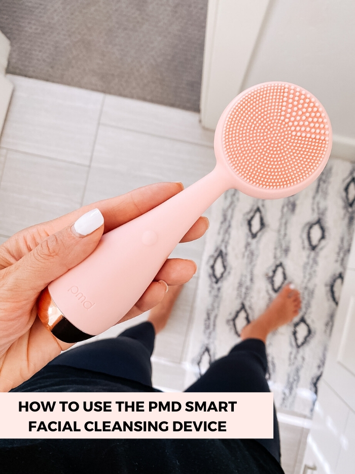 PMD Microdermabrasion by popular Utah beauty blog, A Slice of Style: image of Jenica Parcell holding a PMD smart facial cleaning device.