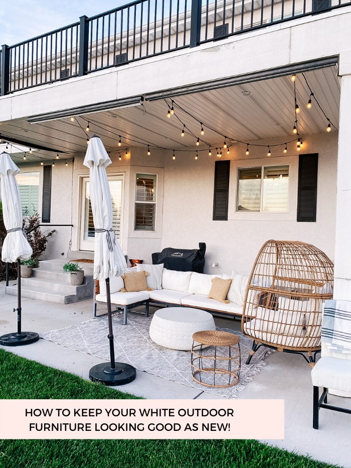 White Outdoor Cushions by popular Utah life and style blog, A Slice of Style: image of a backyard patio with bistro lights, white shade umbrellas, patio furniture and white outdoor cushions. 