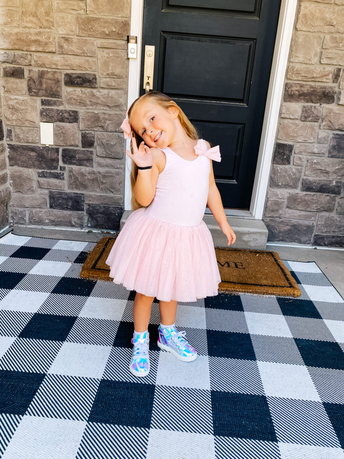 Back to School Fashion with Walmart featured by top Utah lifestyle blogger, A Slice of Style. | Walmart Back to School by popular Utah lifestyle blog, A Slice of Style: image of a little girl wearing a pair of Walmart Wonder Nation Athletic Iridescent High-Top Sneakers and a pink tutu. 