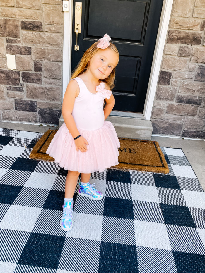 Back to School Fashion with Walmart featured by top Utah lifestyle blogger, A Slice of Style. | Walmart Back to School by popular Utah lifestyle blog, A Slice of Style: image of a little girl wearing a pair of Walmart Wonder Nation Athletic Iridescent High-Top Sneakers and a pink tutu. 