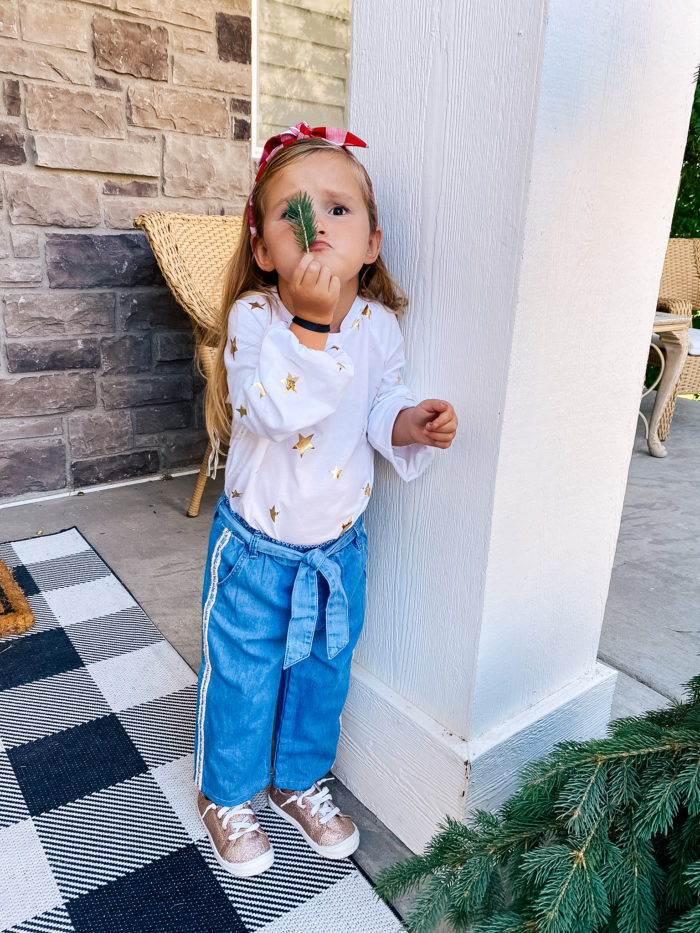 Back to School Fashion with Walmart featured by top Utah lifestyle blogger, A Slice of Style. | Walmart Back to School by popular Utah lifestyle blog, A Slice of Style: image of a little girl wearing a Walmart Wonder Nation Girls Long Sleeve Foil Tie-Front Top, Walmart Wonder Nation Baby Toddler Girl Belted Wide Leg Cropped Jeans, and Walmart Wonder Nation Casual Bump Toe Sneaker.