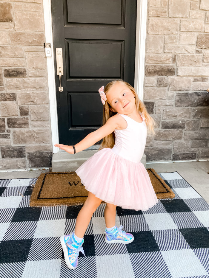 Back to School Fashion with Walmart featured by top Utah lifestyle blogger, A Slice of Style. | Walmart Back to School by popular Utah lifestyle blog, A Slice of Style: image of a little girl wearing a pair of Walmart Wonder Nation Athletic Iridescent High-Top Sneakers and a pink tutu. 