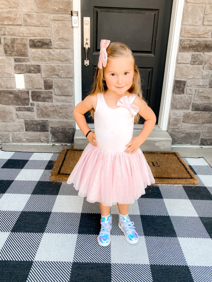 Back to School Fashion with Walmart featured by top Utah lifestyle blogger, A Slice of Style. | Walmart Back to School by popular Utah lifestyle blog, A Slice of Style: image of a little girl wearing a pair of Walmart Wonder Nation Athletic Iridescent High-Top Sneakers and a pink tutu. 