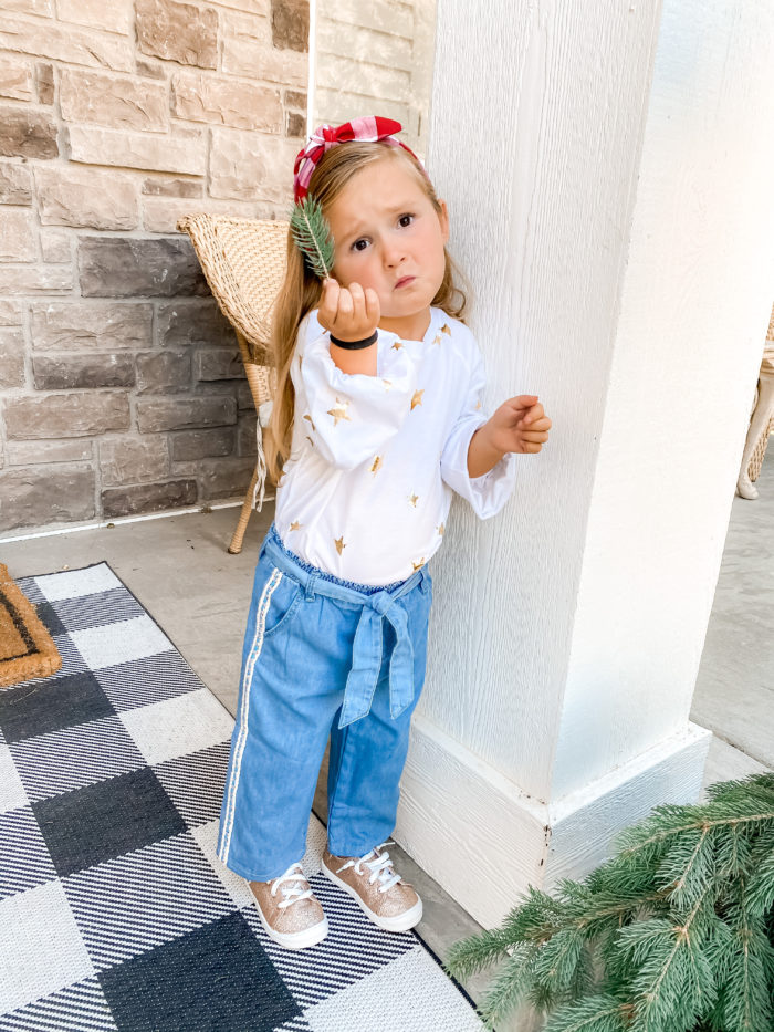 Back to School Fashion with Walmart featured by top Utah lifestyle blogger, A Slice of Style. | Walmart Back to School by popular Utah lifestyle blog, A Slice of Style: image of a little girl wearing a Walmart Wonder Nation Girls Long Sleeve Foil Tie-Front Top, Walmart Wonder Nation Baby Toddler Girl Belted Wide Leg Cropped Jeans, and Walmart Wonder Nation Casual Bump Toe Sneaker.