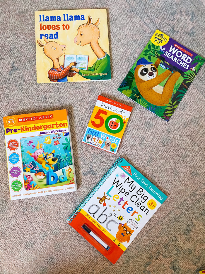 Walmart Back to School by popular Utah lifestyle blog, A Slice of Style: image of Walmart Scholastic Workbooks, flash cards, Scholastic word searches, and Llama Llama loves to read. 