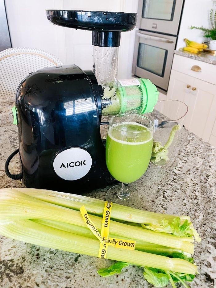 Epstein-Barr | Epstein-Barr Virus by popular Utah lifestyle blog, A Slice of Style: image of a bunch of celery, a glass of celery juice and a Alcok juicer. 