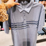 Nordstrom Anniversary Sale by popular Utah fashion blog, A Slice of Style: image of Jenica Parcell holding a TravisMathew blue button up shirt.