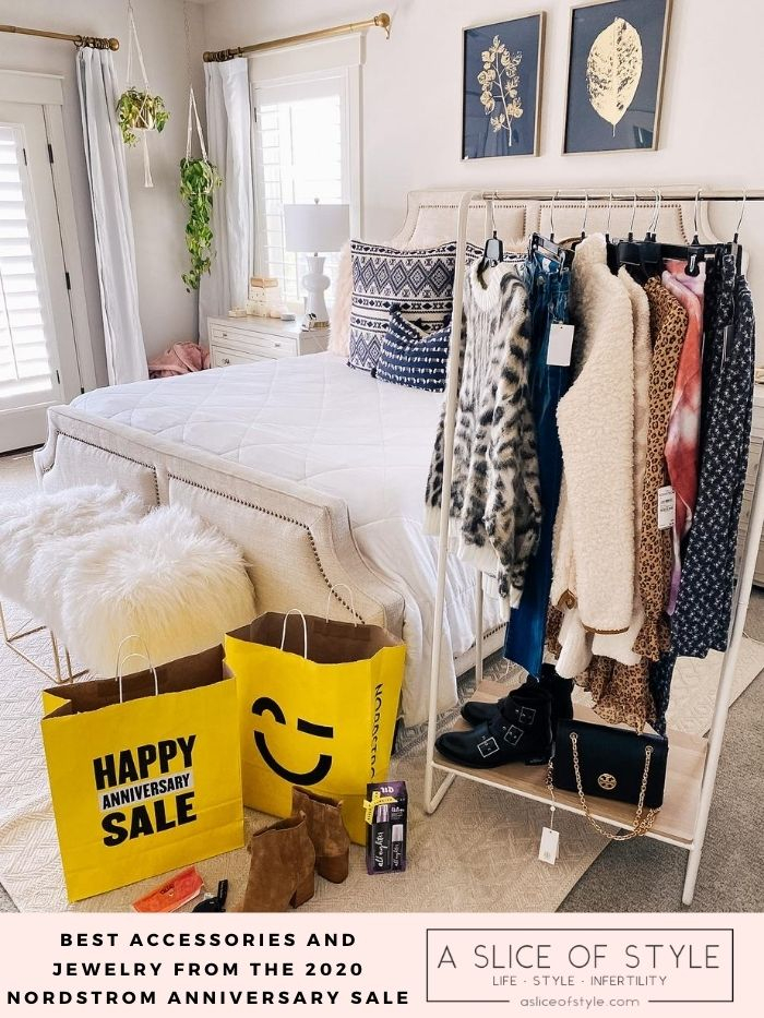 Nordstrom Anniversary Sale by popular Utah fashion blog, A Slice of Style: image of a clothes rack filled with Nordstrom clothes, Nordstrom Anniversary Sale bags, a Tory Burch bag, and a couple pairs of boots. 