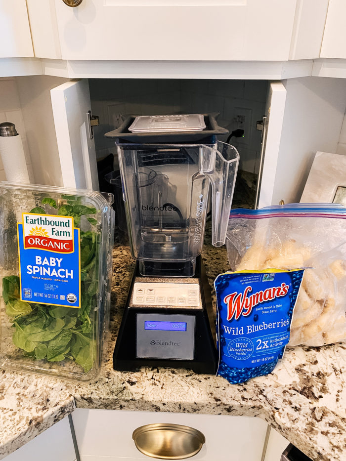 Epstein-Barr Virus by popular Utah lifestyle blog, A Slice of Style: image of organic baby spinach, Wymans wild blueberries, bananas, and a blendtec blender. 