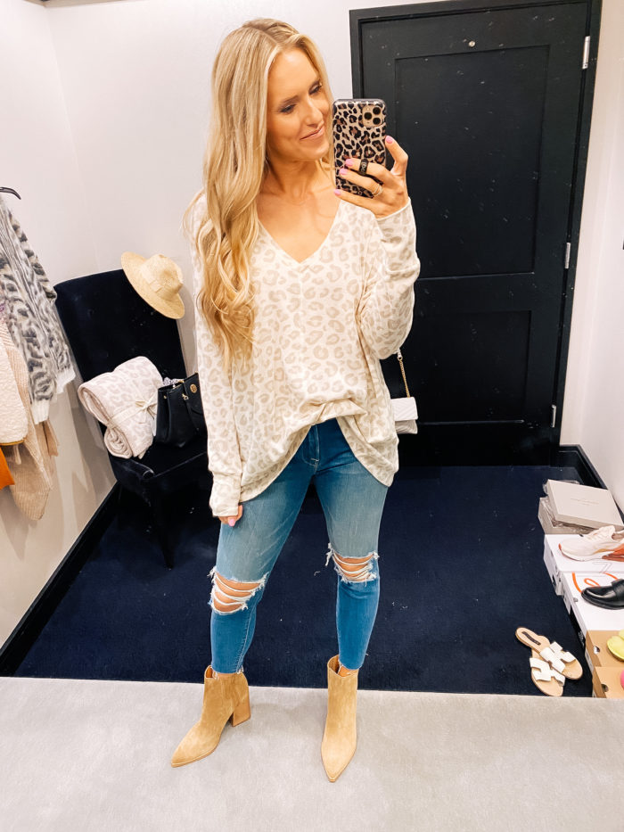 Nordstrom Anniversary Sale by popular Utah fashion blog, A Slice of Style: image of Jenica Parcell wearing a Nordstrom leopard print sweater, distressed denim, and tan suede ankle boots. 