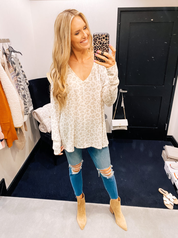 Nordstrom Anniversary Sale by popular Utah fashion blog, A Slice of Style: image of Jenica Parcell wearing a Nordstrom leopard print sweater, distressed denim, and tan suede ankle boots. 